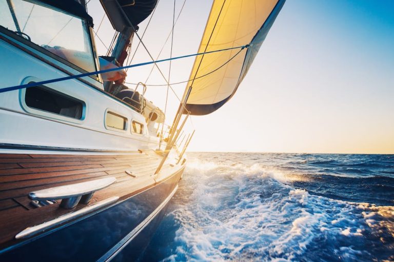 A boat on calm water with a scenic background, symbolizing security and protection, accompanied by a text overlay about boat insurance.